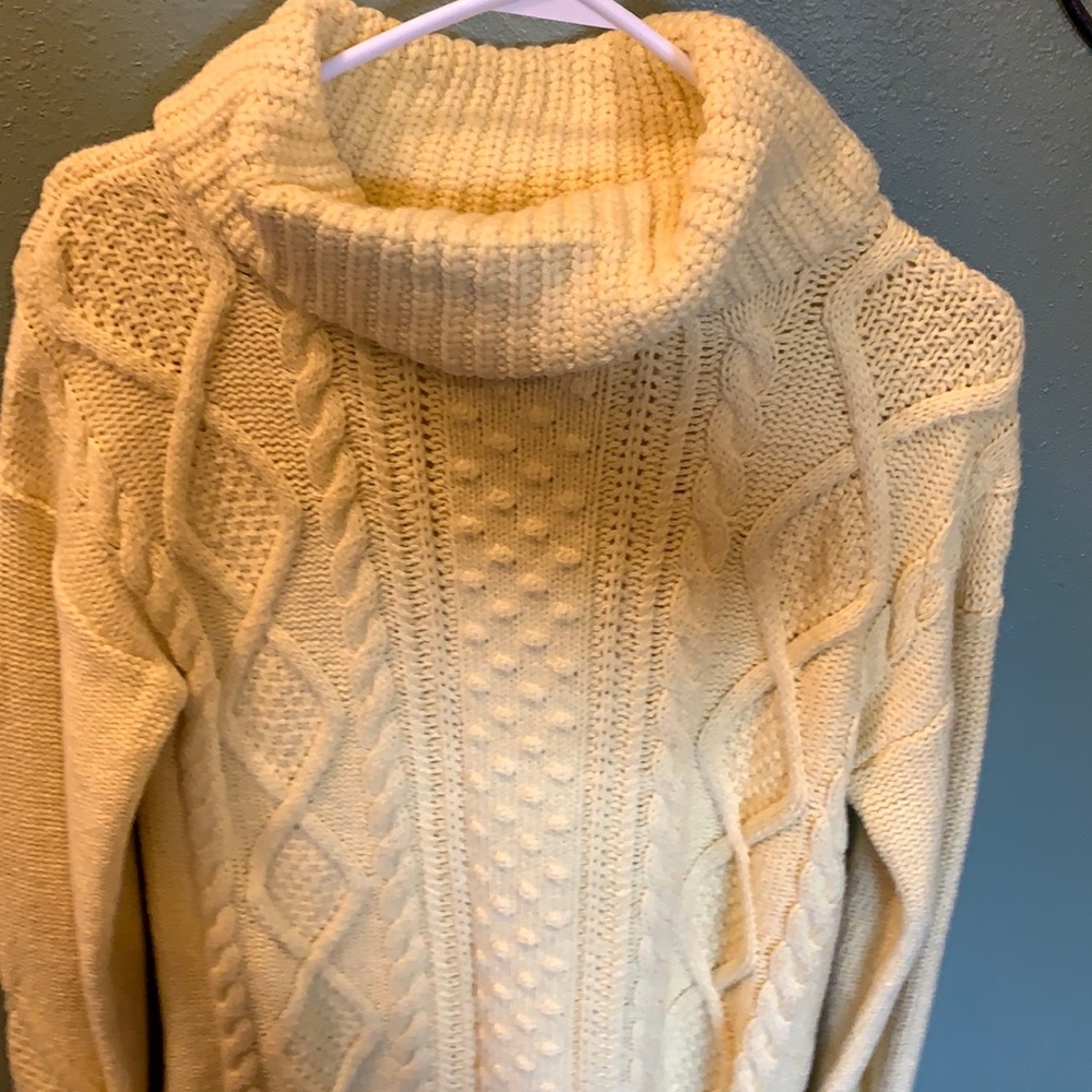 Chunky knit yellow turtleneck.